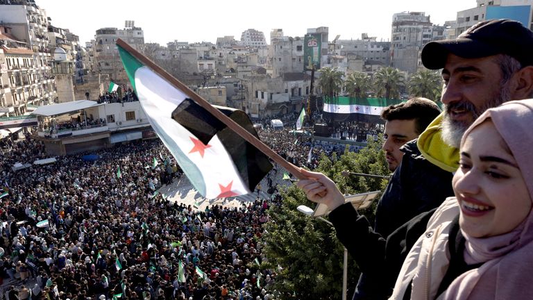 People celebrate after ousting of Syria's Bashar al-Assad, during a gathering after Friday prayers in Latakia, Syria, December 13, 2024. REUTERS/Umit Bektas