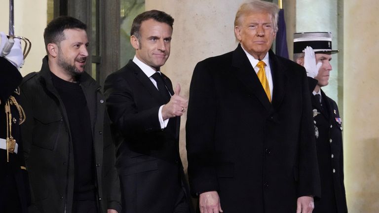 French President Emmanuel Macron, center, President-elect Donald Trump, right, and Ukraine's President Volodymyr Zelenskyy pose after their meeting at the Elysee Palace, Saturday, Dec. 7, 2024 in Paris. (AP Photo/Michel Euler)