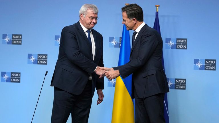 Ukraine's Foreign Minister Andrii Sybiha, left, with NATO chief Mark Rutte in Brussels. Pic: AP

 during a media conference at a meeting of NATO foreign ministers at NATO headquarters in Brussels,Tuesday, Dec. 3, 2024. (AP Photo/Virginia Mayo)