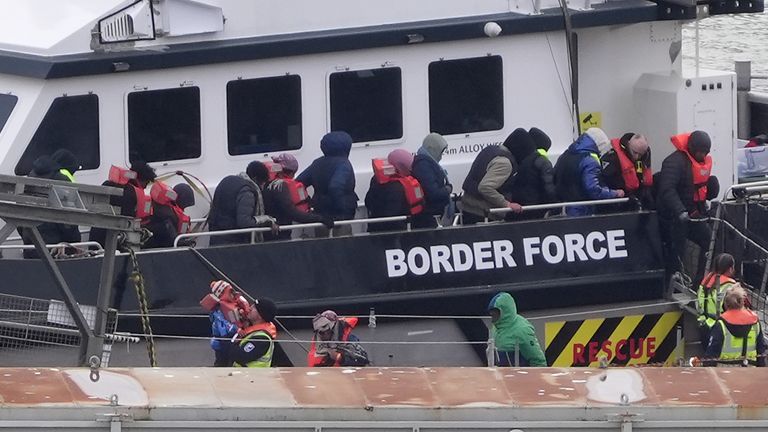 A group of people thought to be migrants, including young children, are brought in to Dover, Kent, from a Border Force vessel following a small boat incident in the Channel. Picture date: Wednesday December 4, 2024.