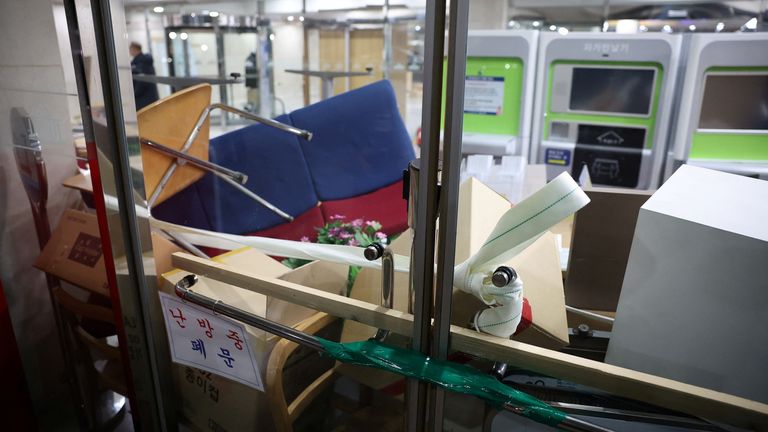 Furniture and boxes are piled up to barricade the entrance doors of the National Assembly.
Pic Reuters