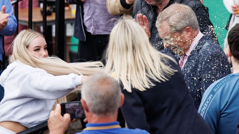 Nigel Farage reacts after a milkshake was tthrown at him in Clacton-on-sea.
Pic: EPA-EFE/Shutterstock