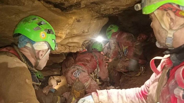 This image released Monday, Dec. 16, 2024 by the Italian Soccorso Alpino (Alpine Rescue) shows the rescue operation of Ottavia Piana, a caver blocked in a deep inside the Bueno Fonteno cave, near Bergamo, Italy, after falling some 5 meters (16 feet) Saturday evening during an expedition. (Soccorso Alpino via AP)