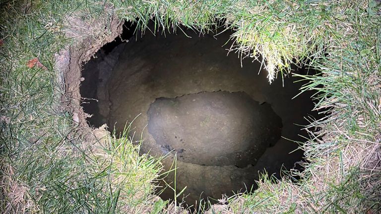 This Tuesday, Dec. 3, 2024. image provided by the Pennsylvania State Police shows the top of a sinkhole in the village of Marguerite, Pa., where rescuers were searching for a woman who disappeared. (Pennsylvania State Police via AP)