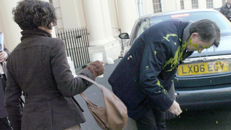 Plane Stupid handout photo of Business Secretary Lord Mandelson after a cup of green custard was thrown over him by environmentalist Leila Deen as he arrived at the launch of the Government's low carbon economy summit in central London.
Pic: PA