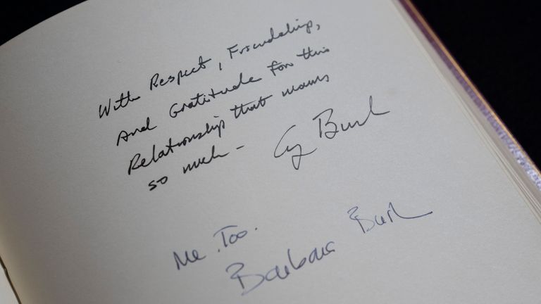 The signatures of US President George Bush and his wife Barbara are seen in one of three Downing Street Visitors Books at the National Archives. The three gilt-edged volumes, covering the years 1970, when Edward Heath was prime minister, to 2003 when Tony Blair was in office, have been released to the National Archives at Kew, west London. Picture date: Wednesday December 18, 2024.

