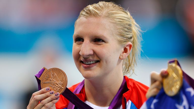 Britain's Rebecca Adlington poses with her bronze medal during the women's 800m freestyle victory ceremony at the London 2012 Olympic Games at the Aquatics Centre August 3, 2012. REUTERS/Michael Dalder (BRITAIN - Tags: SPORT SWIMMING OLYMPICS)