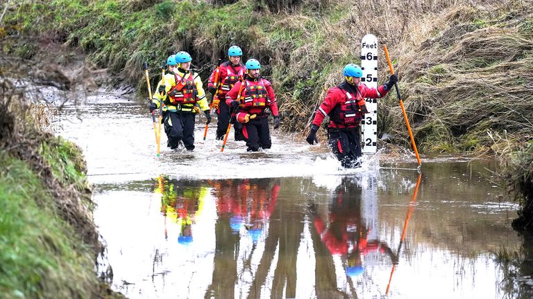 Members of a search and rescue team during a search operation at Abberwick Ford on the River Aln.
Pic: PA