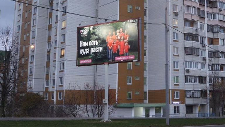 The Asachyov's on a billboard promoting having children to families in Russia