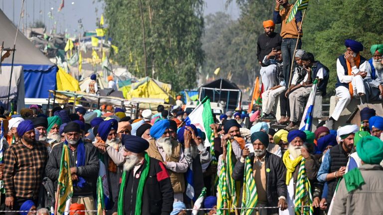 Protesting farmers, who were marching to New Delhi, are stopped by the police near the Punjab-Haryana border at Shambhu, India, Friday, Dec. 6, 2024. (AP Photo/Rajesh Sachar)