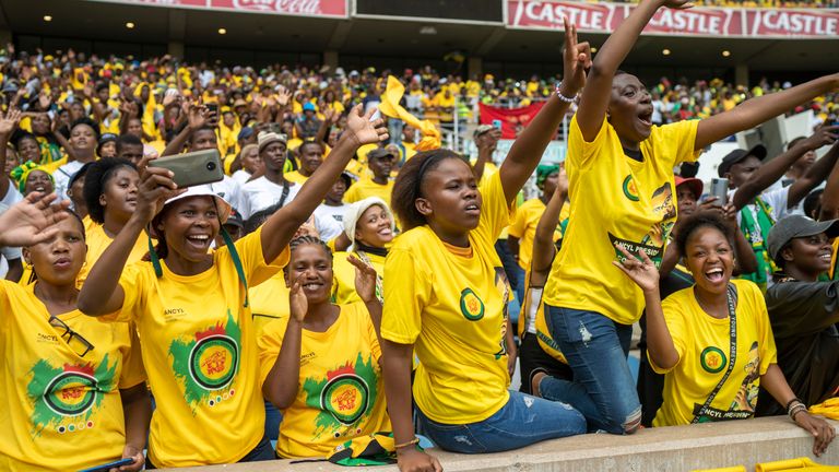 African National Congress supporters cheer South African President Cyril Ramaphosa at the Mose Mabhida stadium in Durban, South Africa, Saturday, Feb. 24, 2024, for their national manifesto launch in anticipation of the 2024 general elections. (AP Photo/Jerome Delay)