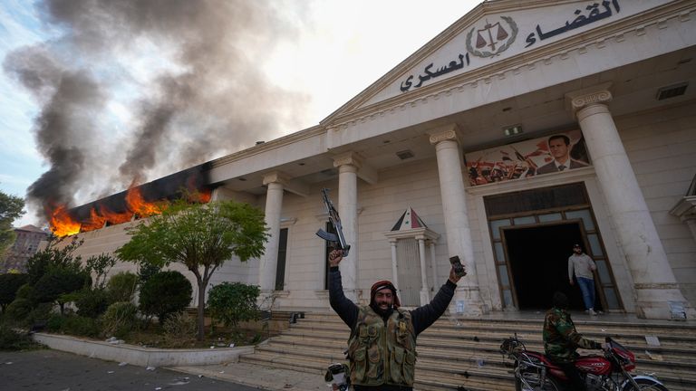 Rebels burn down a military court in the capital: Pic: AP