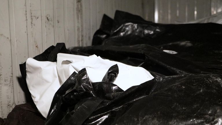 Body bags pile up