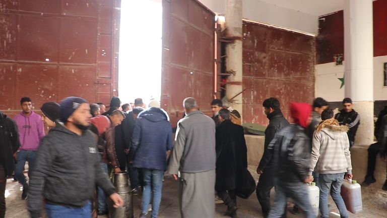 Thousands of Syrians have flooded to the prison to search for relatives