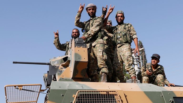 Syrian National Army fighters drive into Sanliurfa province, Turkey in 2019. Pic: Reuters