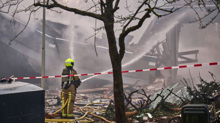 A firefighter at the scene in The Hague. Pic: AP