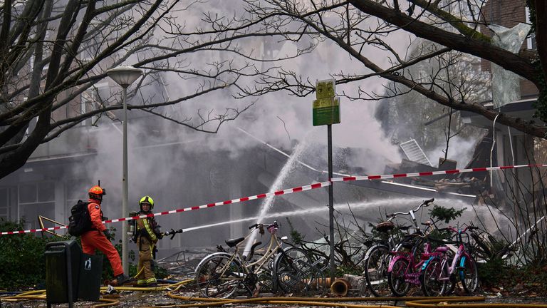 Firefighters at the scene in The Hague. Pic: AP