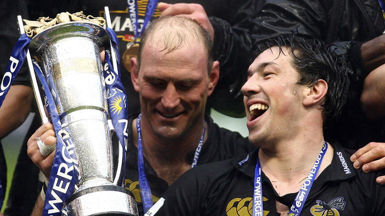 Wasps captain Lawrence Dallaglio (L) and Tom Voyce celebrate with the trophy following the Powergen Cup Final at Twickenham, London, Sunday April 9, 2006. London Wasps beat Llanelli Scarlet's 26-10.
