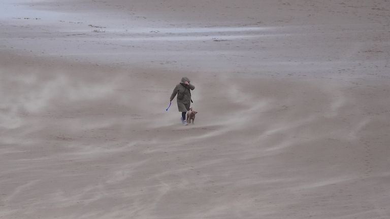 Sand is whipped up by the wind on Tynemouth Longsands on the North East coast of England. Snow, rain and wind warnings are in force and are expected to cause travel issues on New Year's Eve. Picture date: Tuesday December 31, 2024.