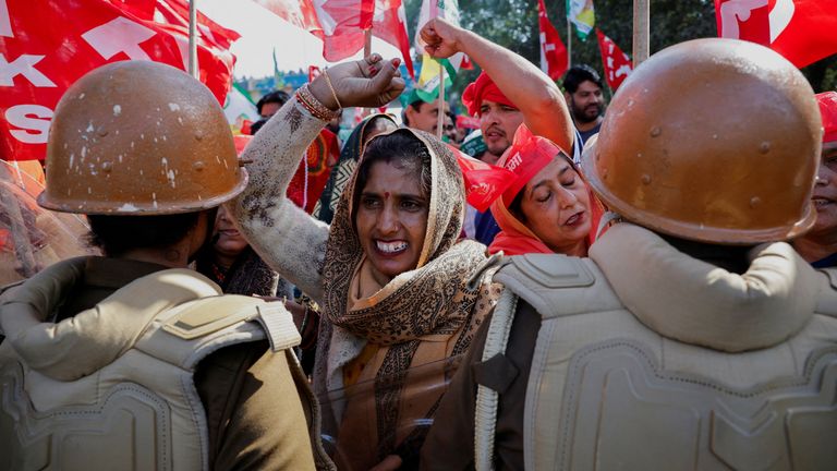 Farmers from the northern state of Uttar Pradesh shout slogans as they protest to demand better compensation for their land, in Noida, India, December 2, 2024. REUTERS/Anushree Fadnavis TPX IMAGES OF THE DAY