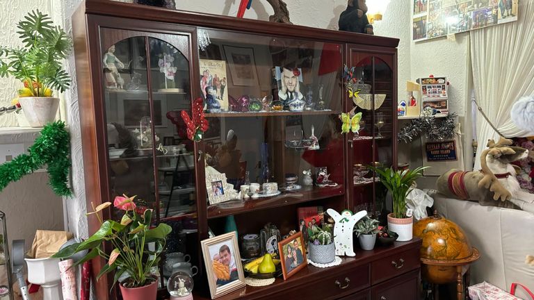 Ms Kenyon's home features cast photos and merchandise signed by cast members