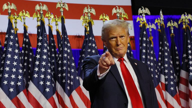 Republican presidential nominee and former U.S. President Donald Trump takes the stage to address supporters at his rally, at the Palm Beach County Convention Center in West Palm Beach, Florida, U.S., November 6, 2024. REUTERS/Brian Snyder