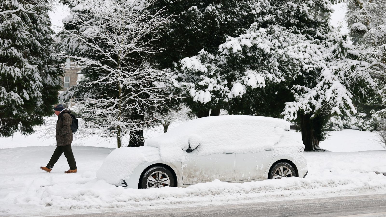 UK weather: ‘Significant’ snow forces cars to crawl and delays trains after amber alert – with more warnings to come