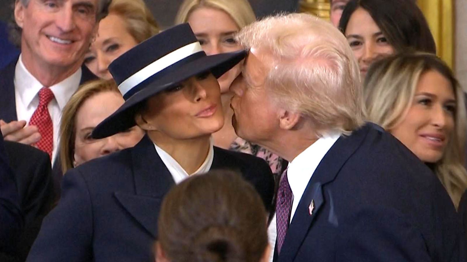 Awkward moment as Donald Trump fails to kiss Melania moments before inauguration oath