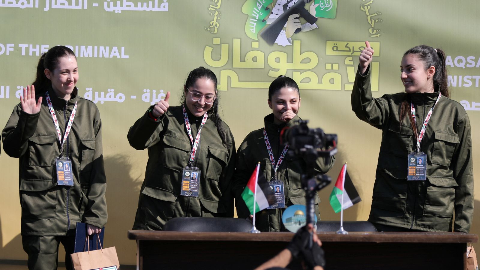 Four female soldiers reunite with families in Israel - as freed Palestinian prisoners carried by huge crowds in West Bank