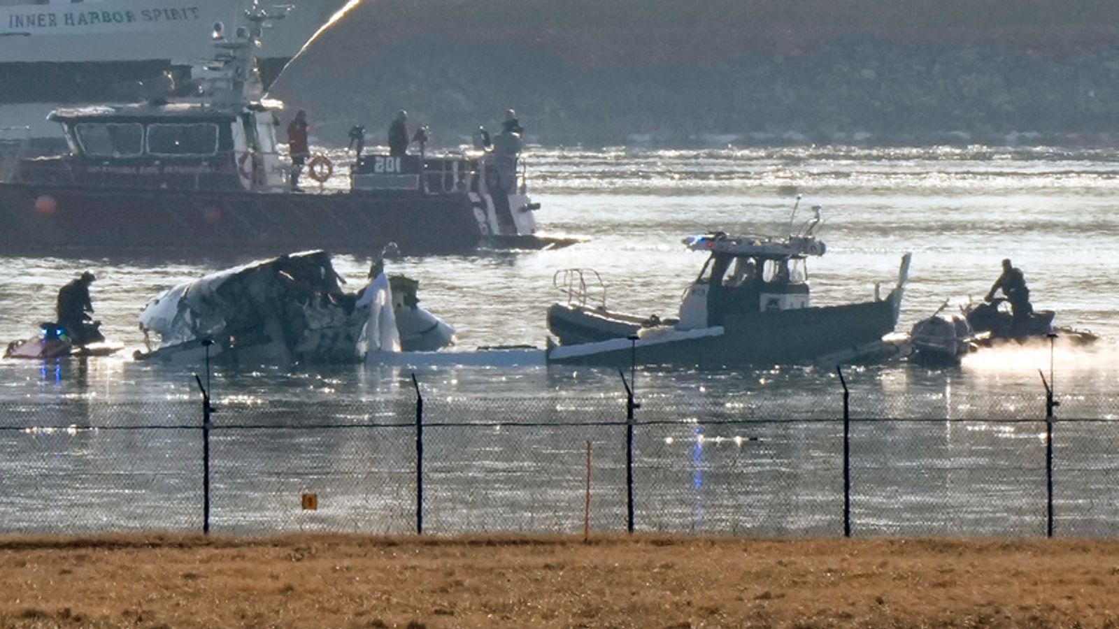 Washington plane collision aerial view shows crash site as crews