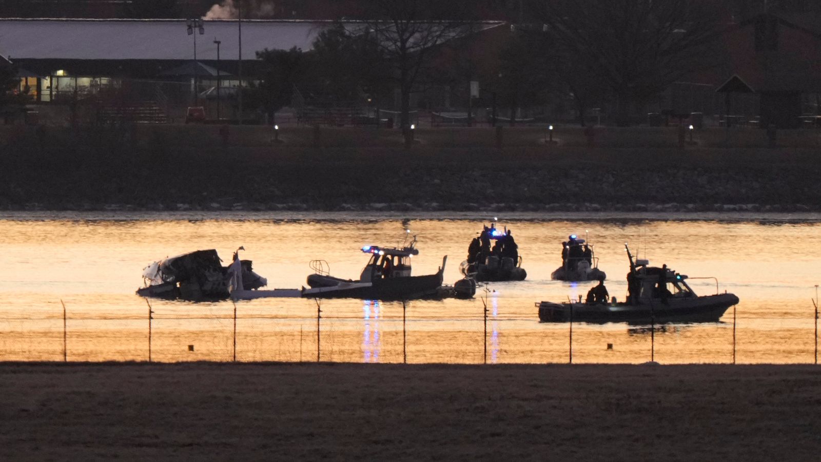 American Airlines jet found upside down and in three pieces after mid-air collision in Washington DC