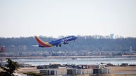 A plane departs Ronald Reagan Washington National Airport.
Pic: Reuters
