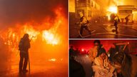 Firefighters  work to extinguish the Palisades fire as residents at a centre are evacuated  in Altadena.
Pic: Reuters/AP