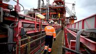 A member of the Centrica crew walks along a gangway on the the Rough 47/3B Bravo gas platform in the North Sea ahead of a visit by Prime Minister Rishi Sunak and Energy Security and Net Zero Secretary Claire Coutinho, while on the General Election campaign trail. Picture date: Monday June 17, 2024.