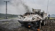 A UN armoured personnel carrier burns during clashes with M23 rebels outside Goma. Pic: AP
