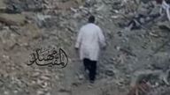 This is believed to be one of the last photos taken of Dr Hussam Abu Safiya before he was detained, walking towards Israeli tanks