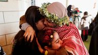 Freed Palestinian prisoner Nidaa Zaghebi is greeted by her daughters, after her release from an Israeli. Pic: Reuters