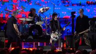 Joan Jett, second from right, performs with Pat Smear, from left, Dave Grohl, and Krist Novoselic of Nirvana during the FireAid benefit concert on Thursday, Jan. 30, 2025, at The Forum in Inglewood, Calif. (AP Photo/Chris Pizzello)