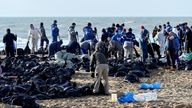People work to clear spilled oil on the coastline following an incident involving two tankers damaged in a storm in the Kerch Strait, in the settlement of Blagoveshchenskaya near the Black Sea resort of Anapa in the Krasnodar region, Russia December 21, 2024. REUTERS/Sergey Pivovarov