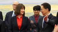 Chinese Vice President Han Zheng gestures to Britain's Chancellor of the Exchequer Rachel Reeves following a photo session at the Great Hall of the People in Beijing, Saturday, Jan. 11, 2025. (Florence Lo/Pool Photo via AP)