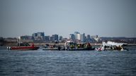 U.S. Coast Guard, along with other search and rescue teams, operate near debris at the crash site in the Potomac River in a location given as Washington, in the aftermath of the collision of American Eagle flight 5342 and a Black Hawk helicopter that crashed into the Potomac River, U.S. January 30, 2025. Taylor Bacon/U.S. Coast Guard/Handout via REUTERS