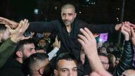 Zaharia Zubeidi , former leader of the Al-Aqsa Martyrs Brigade, an armed offshoot of the secular Fatah party, is greeted upon his arrival after being released from an Israeli prison in the West Bank city of Ramallah, Thursday Jan. 30, 2025.(AP Photo/Nasser Nasser)