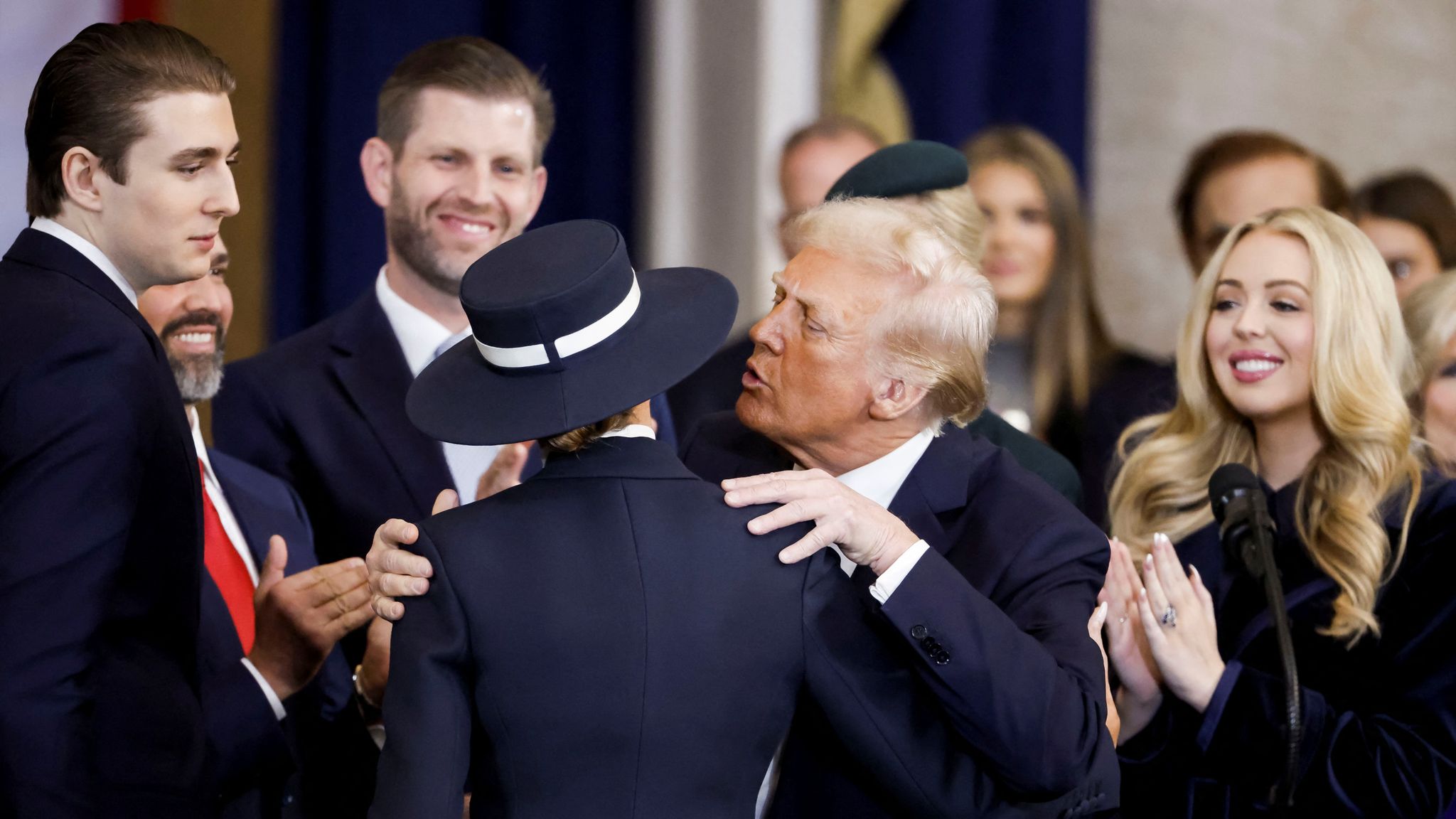 Awkward moment as Donald Trump fails to kiss Melania moments before