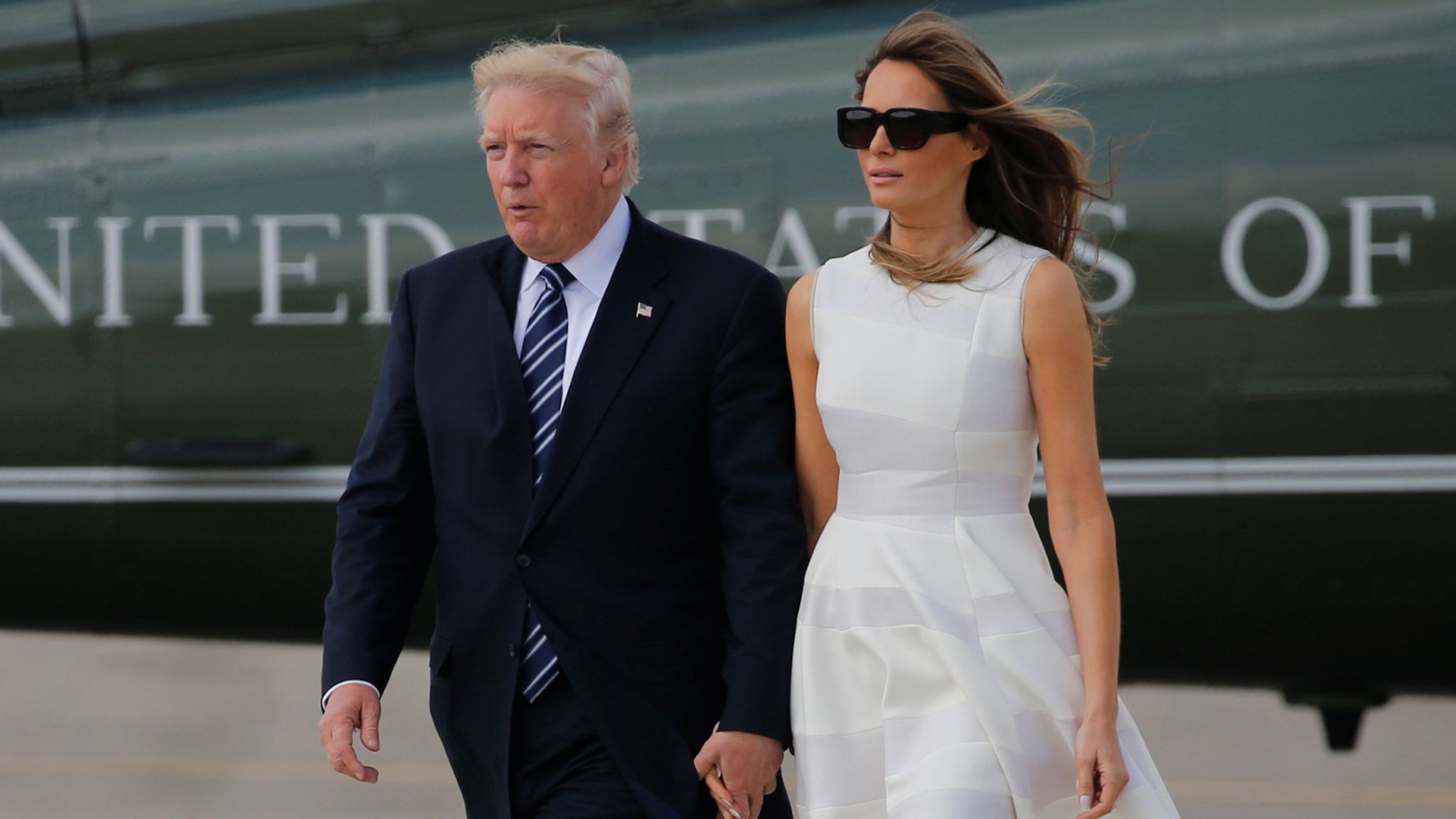 Awkward moment as Donald Trump fails to kiss Melania moments before