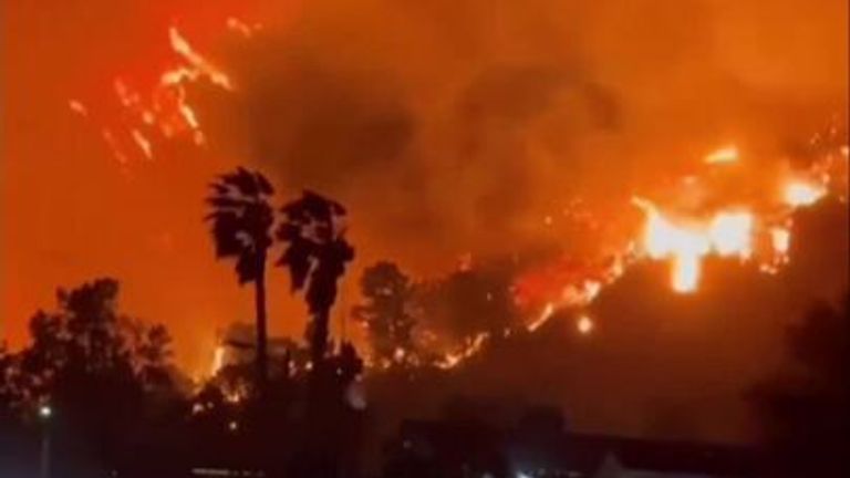 Wildfires spread as state of emergency declared in Los Angeles suburbs