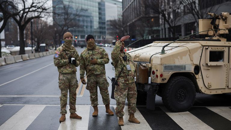 U.S. Army officers stand guard, ahead of a rally for U.S. President-elect Donald Trump the day before he is scheduled to be inaugurated for a second term, in Washington, U.S., January 19, 2025. REUTERS/Marko Djurica