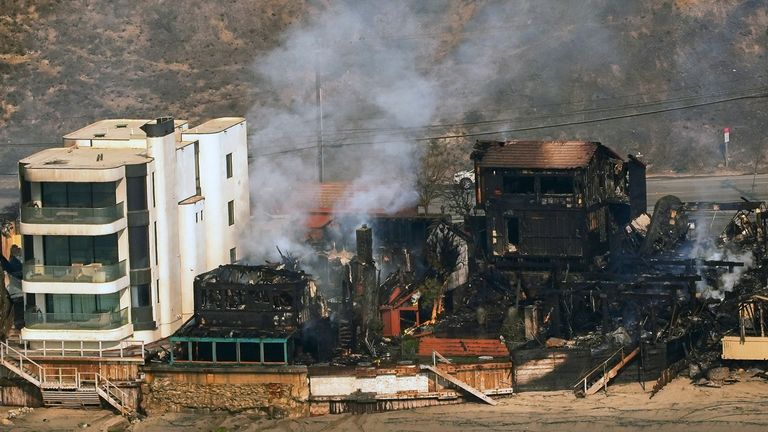 Beach front properties are left destroyed by the Palisades fire.
Pic: AP