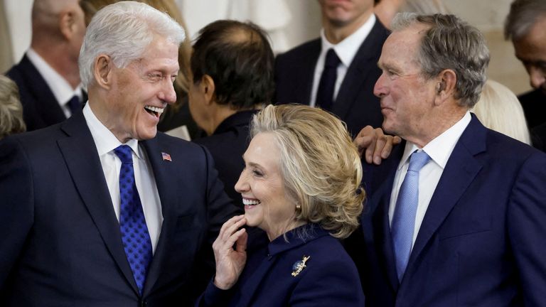 Former President Bill Clinton (left), his wife Hillary, and former President George W Bush (right). Pic: Reuters