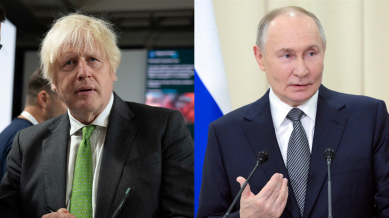 Boris Johnson and Vladimir Putin.
Pic: AP/Reuters
