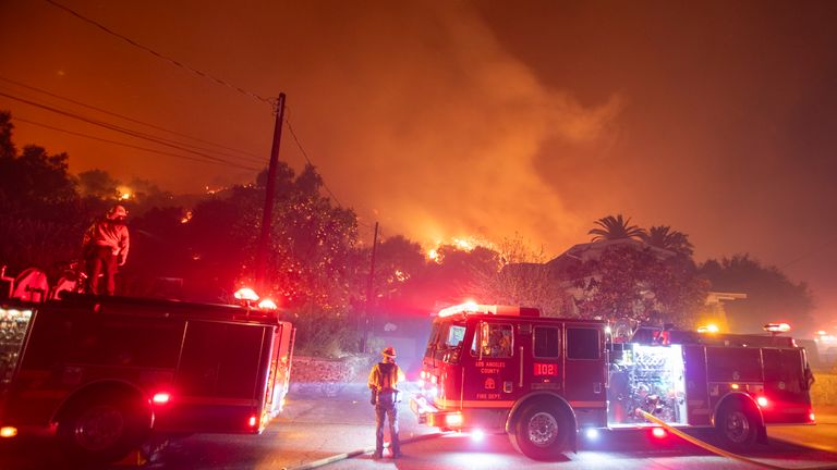 Firefighters combat the Eaton fire as it blazes in Sierra Madre, east side of Los Angeles.
Pic: Ringo Chiu/AP